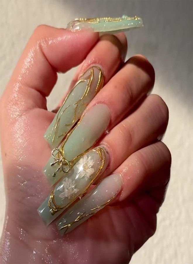 SINHOT Coffin Press on Nails Long - Halcyon Green Fake Nails Glossy Glue on Nails Gold Line Bowknot Acrylic Nail White Flower Ballerina Artificial Nail Stick on False Nail with Design 24pcs - Image 1